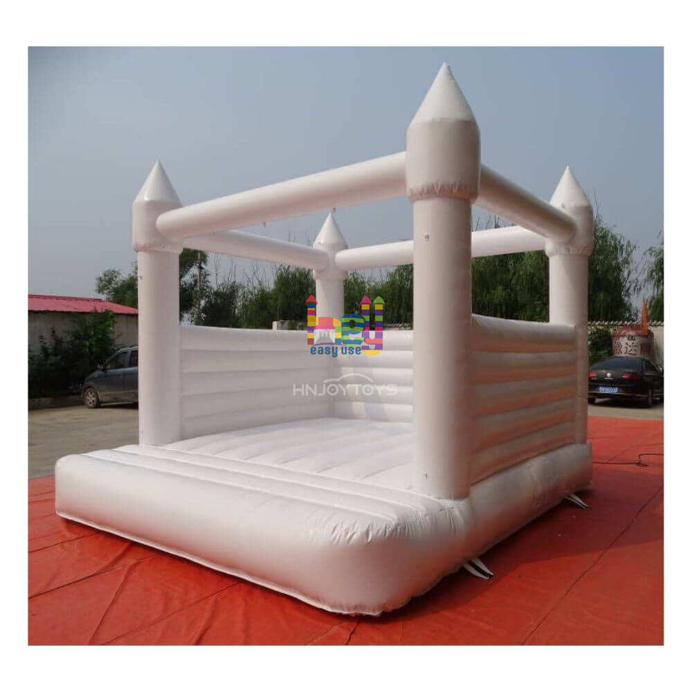 white blow up bounce house