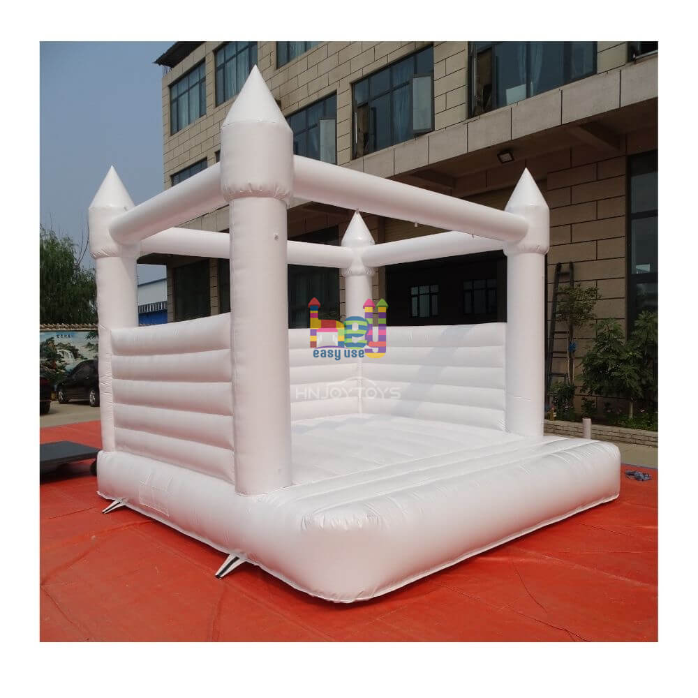 white blow up bounce house