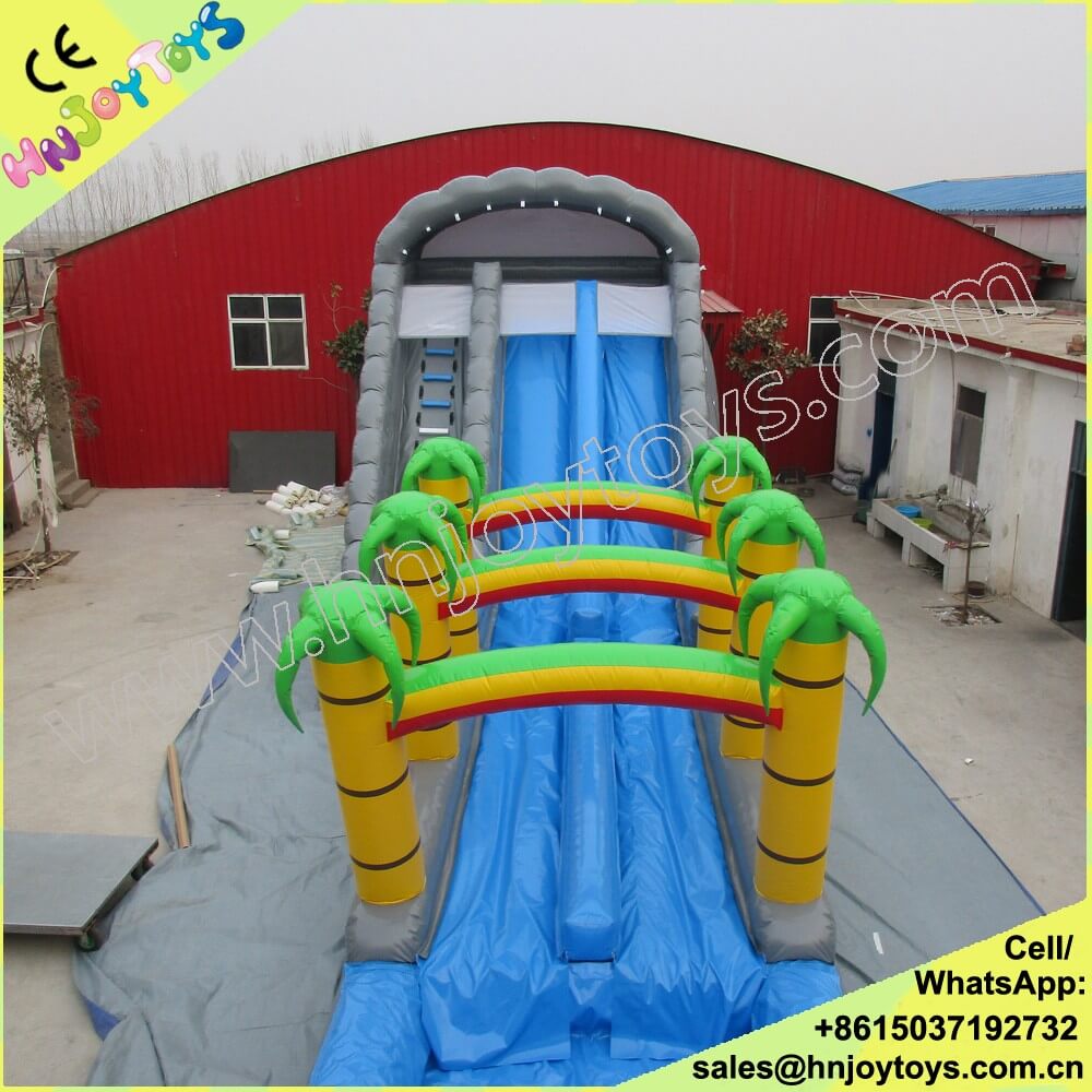 colorful inflatable slide palm tree