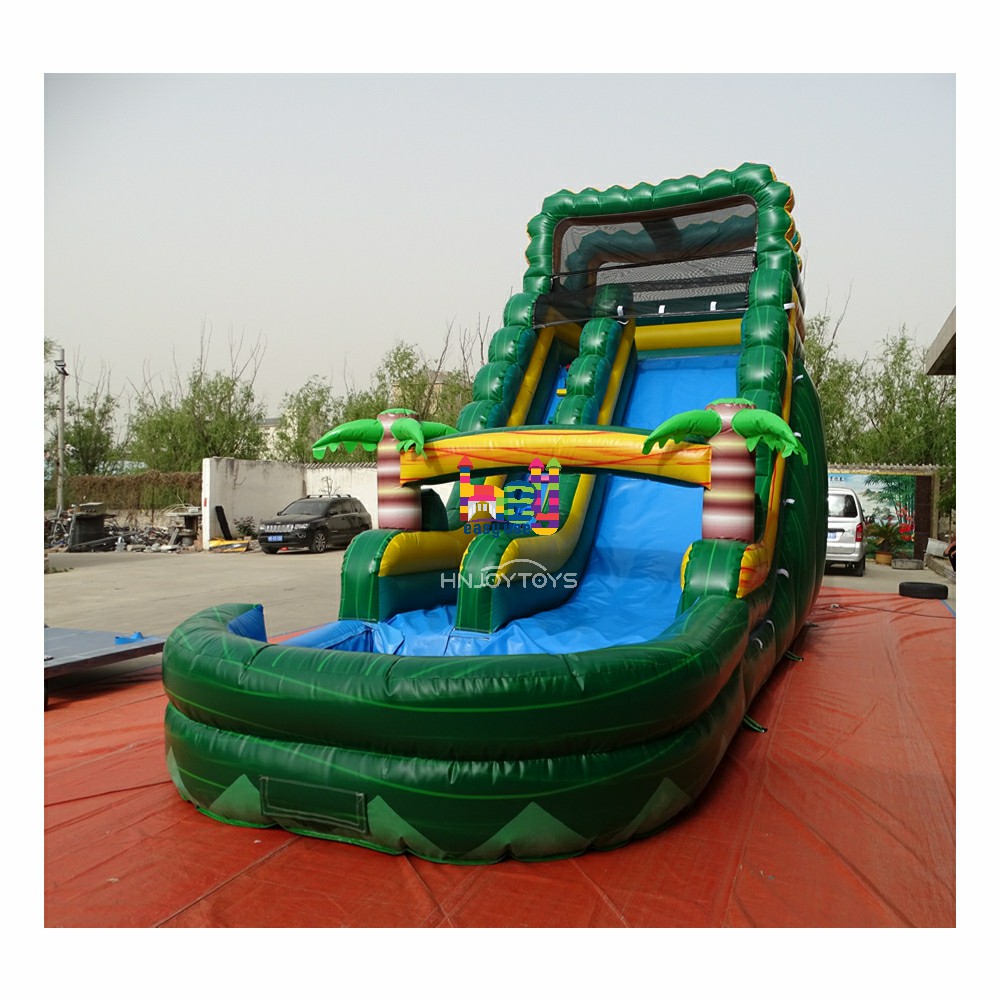 summer playing inflatable bounce castle with water slide