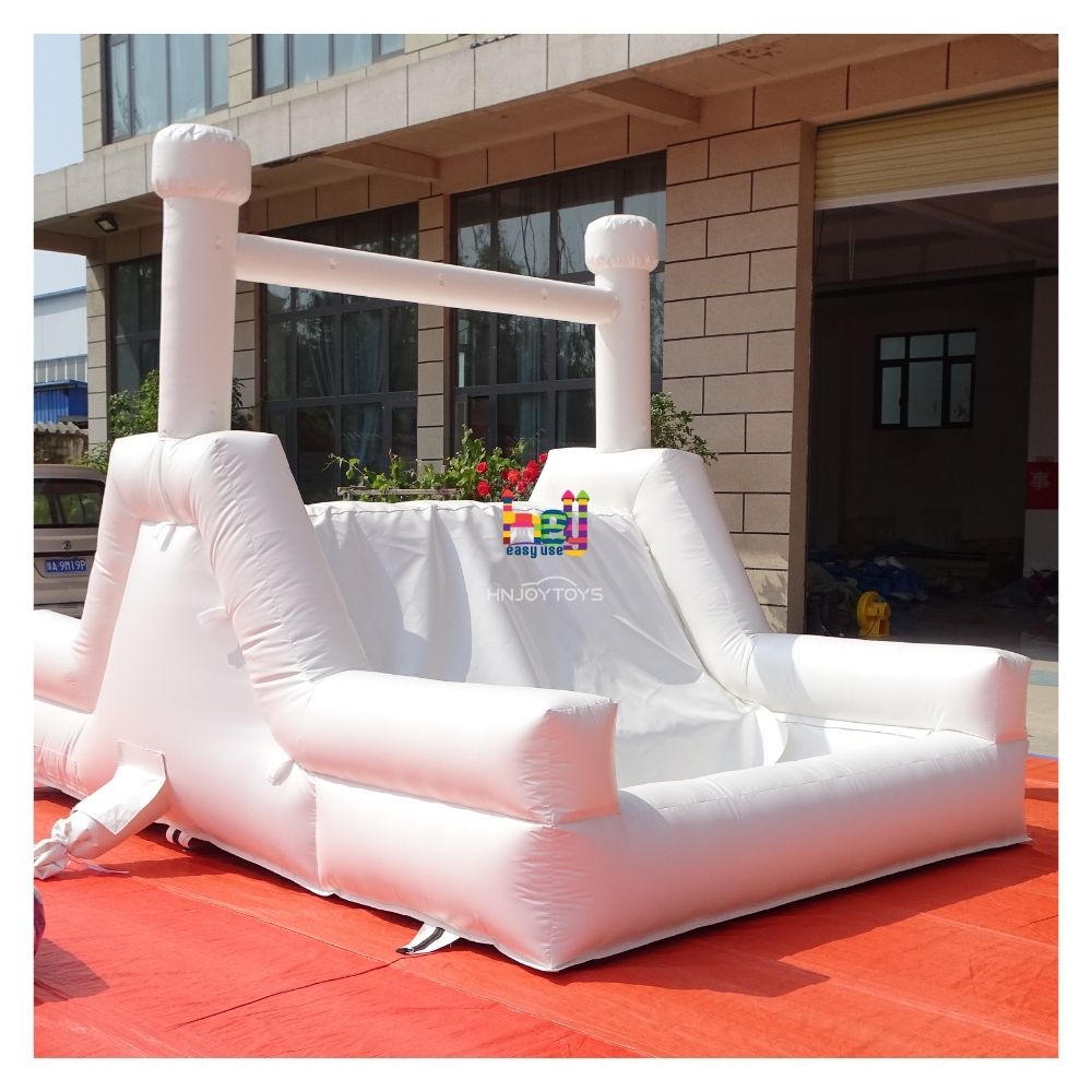 white inflatable wedding bounce house with slide