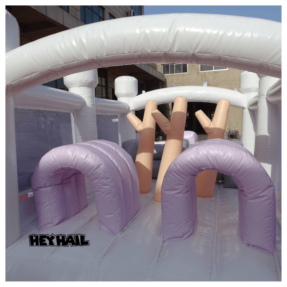 colorful commercial bounce house obstacles course